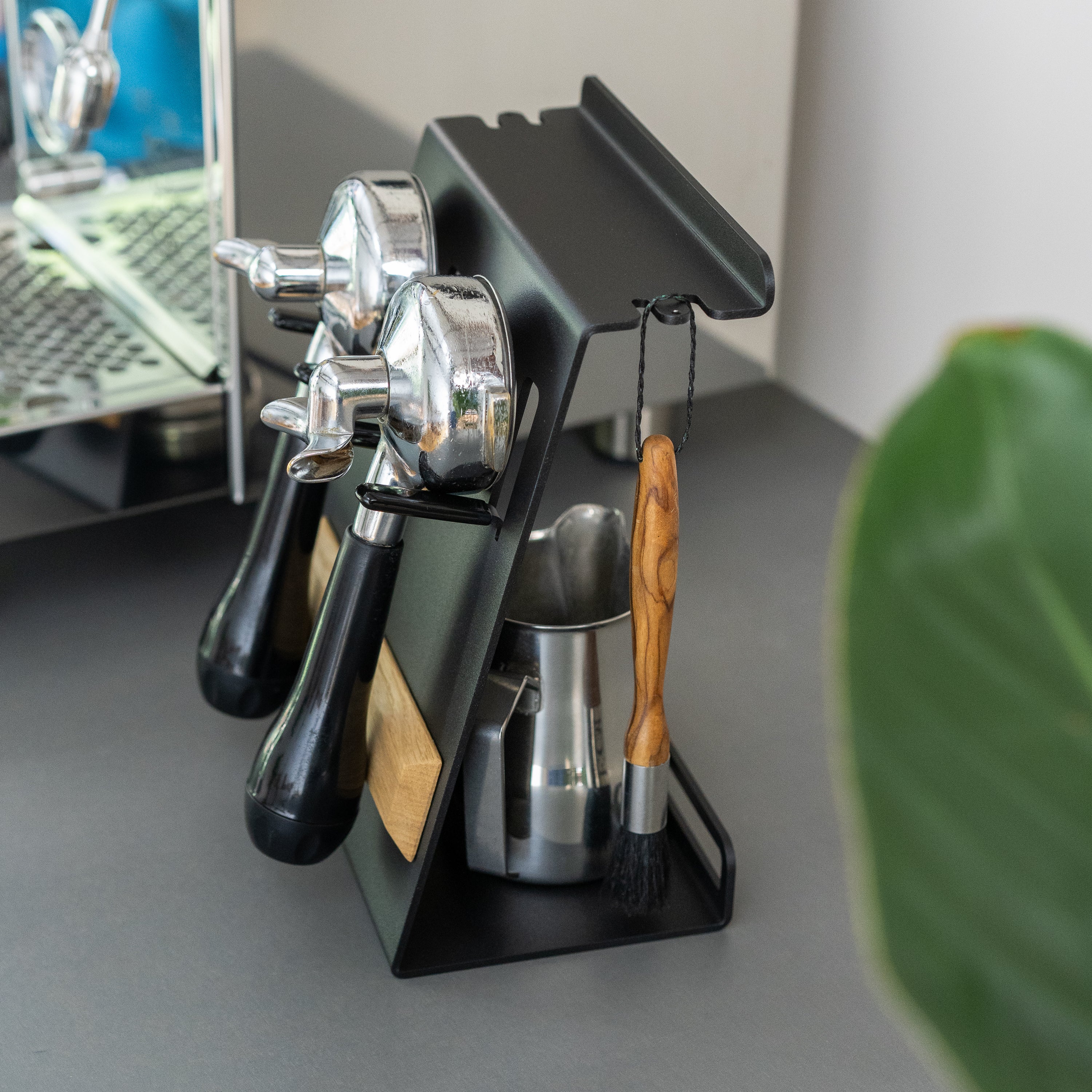 Compact station with portafilter holder for barista accessories